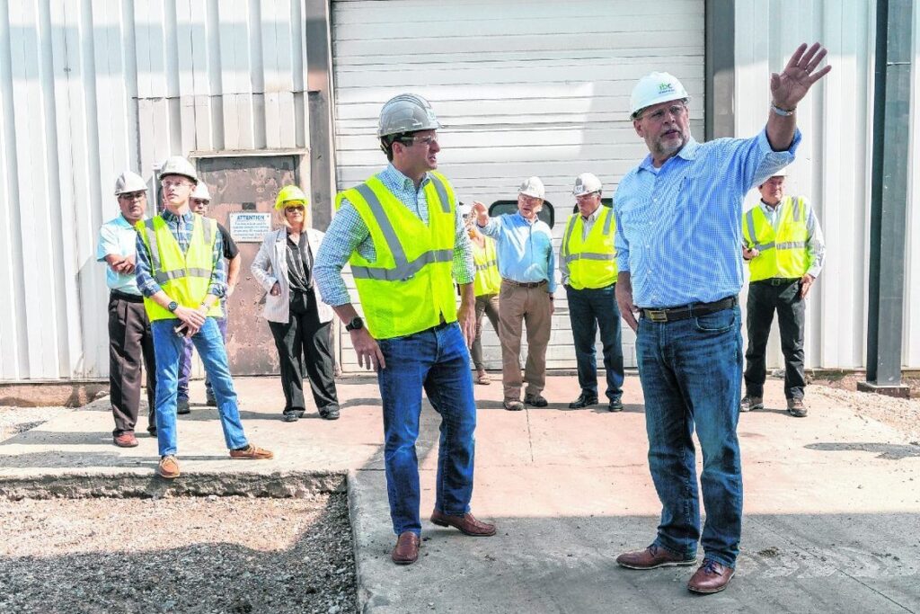 Mark Wolma, President of IBC's Copper Alloys Division (right) shows Congressman Hollingsworth around the ongoing construction of IBC's new expansion at its Franklin, Ind. facility.